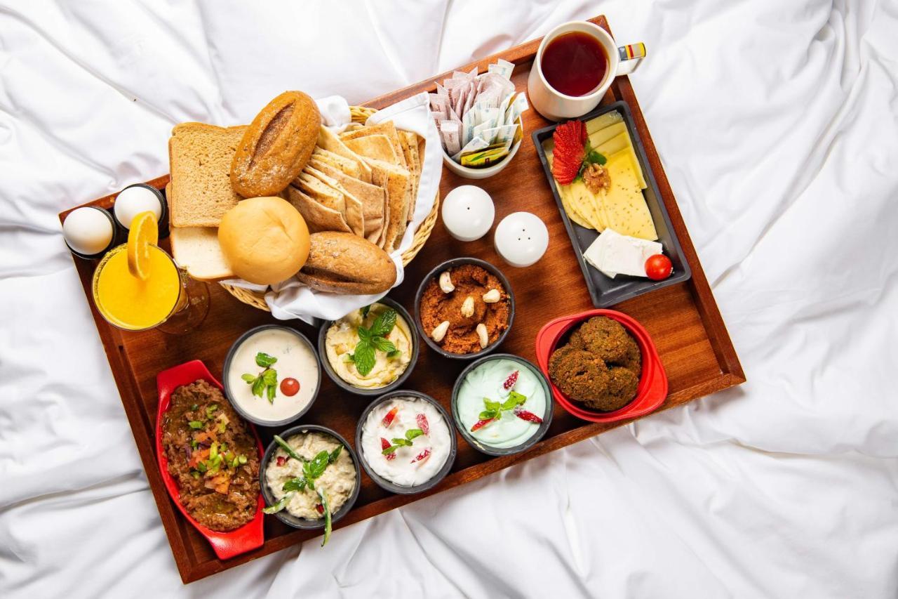 Park Inn By Radisson Makkah Aziziyah Mecca ภายนอก รูปภาพ A typical breakfast in India
