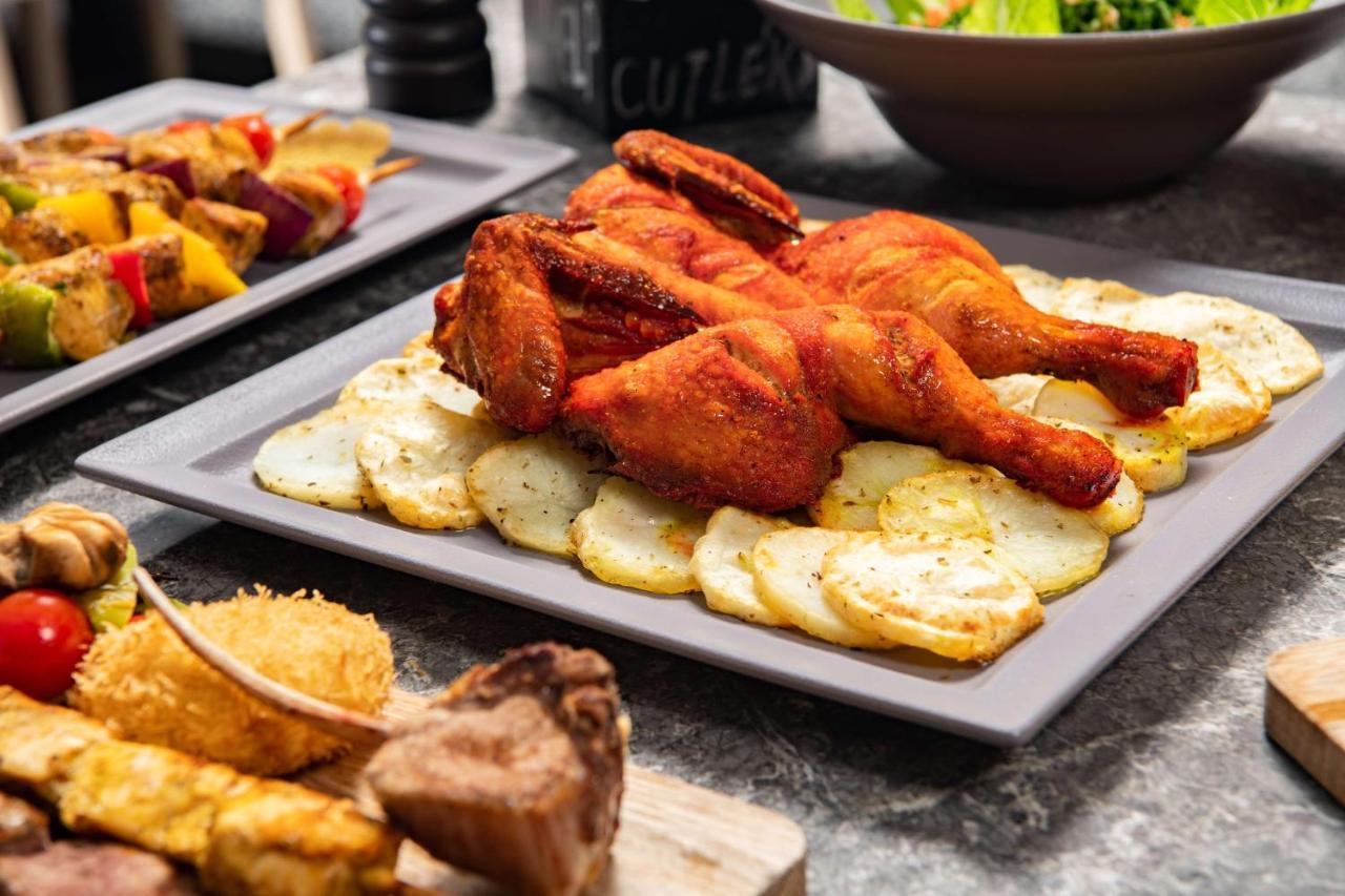 Park Inn By Radisson Makkah Aziziyah Mecca ภายนอก รูปภาพ A plate of chicken pakora